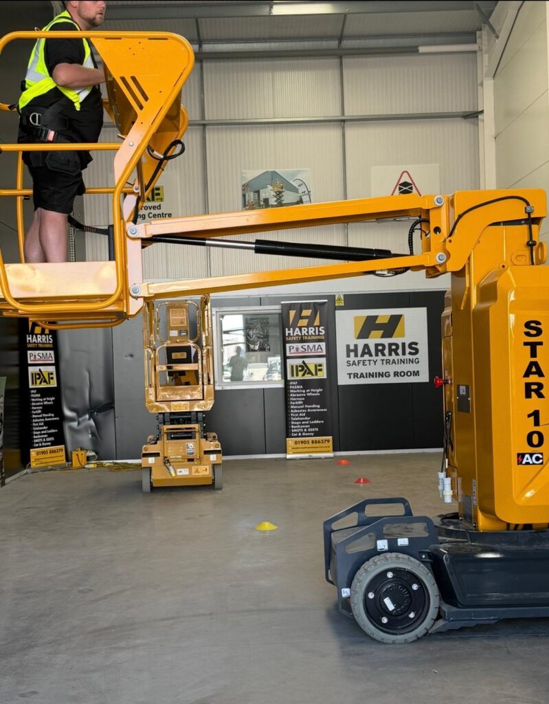Yellow STAR 10 powered access platform during indoor training at Harris Safety Training Services
